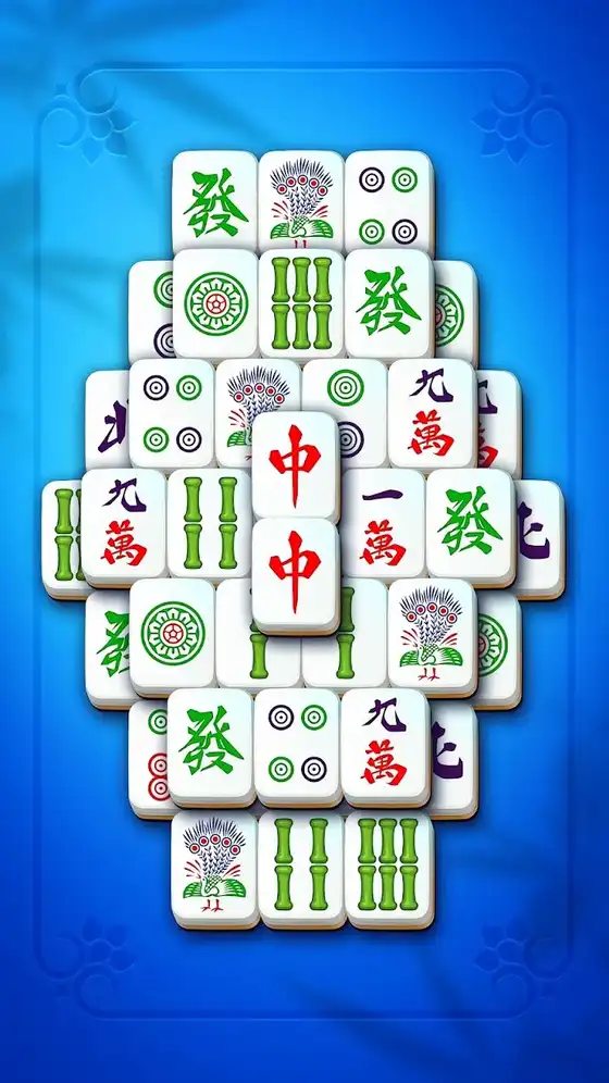 Ταμπλό του Mahjong Club με πλακίδια σε σχήμα πυραμίδας και το κουμπί υπόδειξης κάτω δεξιά